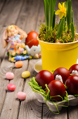 Easter cake and eggs. Rustic background. Selective focus.