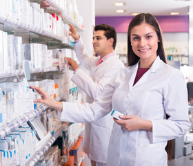 pharmacist  posing in drugstore