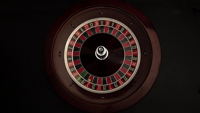 Roulette wheel is spinning slowly then stops black