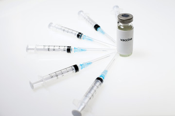 Syringes and vaccine capsule. Vaccination. Influenza