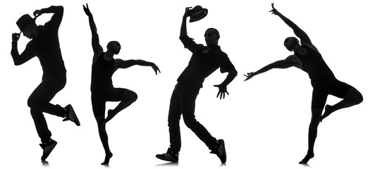 Silhouettes of dancers in dancing concept
