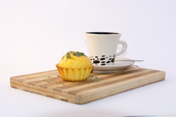 muffin served with cup of tea