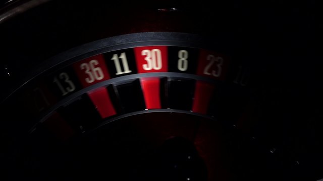 Roulette, number 7, red, shadow, close up