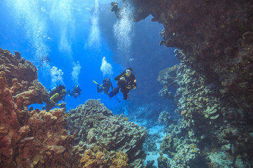 Divers explore cave's