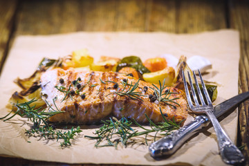 Grilled salmon on a wooden table