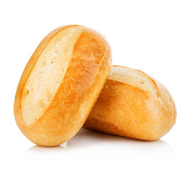 Two loaves of fresh homemade bread close-up isolated on a white background.