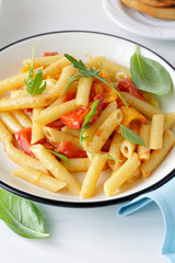 pasta with cheese sauce and tomato