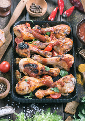 Hot and spicy drumsticks on serving pan
