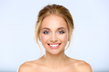 Portrait of beautiful woman on white background