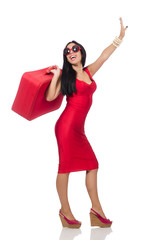 Woman in red dress with suitcase on white