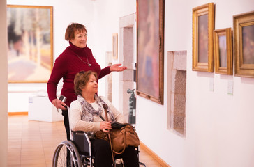 Two woman in art gallery