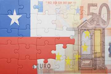 puzzle with the national flag of colombia and euro banknote