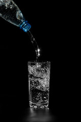 water is poured from a bottle