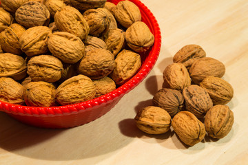 Walnuts on a rustic wooden table
