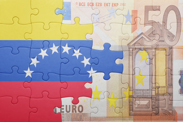 puzzle with the national flag of venezuela and euro banknote