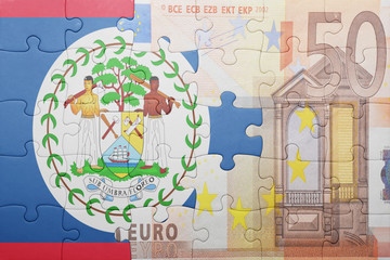 puzzle with the national flag of belize and euro banknote