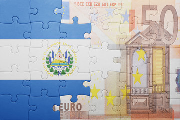 puzzle with the national flag of el salvador and euro banknote