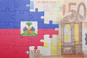 puzzle with the national flag of haiti and euro banknote