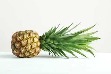 Ripe pineapple on a blue wooden table