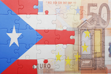 puzzle with the national flag of puerto rico and euro banknote