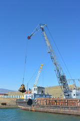 Fototapeta premium Extraction of sand from the bottom of Lake Baikal