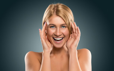 Obraz premium Portrait beautiful blond woman with blue eyes smiling, closeup