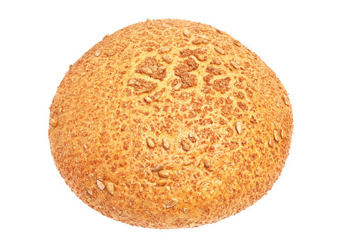 Fresh, round bread with sunflower seeds isolated on white