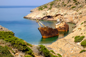 Scenic view of abandoned rusty shipwreck, Amorgos island - obrazy, fototapety, plakaty