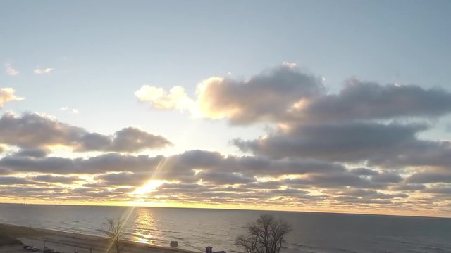 time-lapse of sunset on Lake Michigan