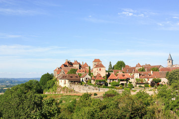 Medieval village of Loubressac, Lot, France in evening light, one of the listed Most Beautiful Villages of France