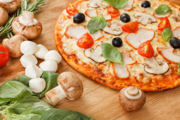 Pizza with mushrooms and vegetables