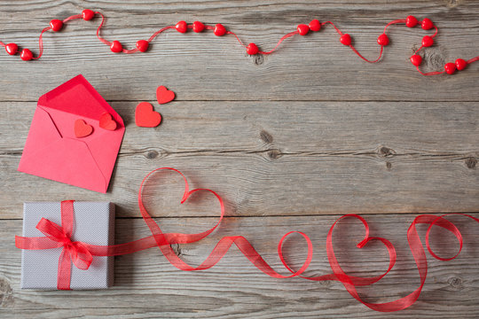 Gift in a box on Valentine's Day, hearts and ribbon