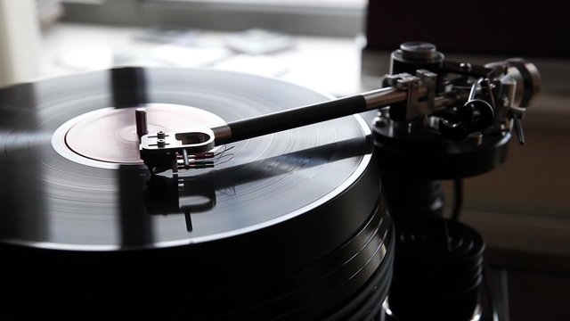 Record player playing vinyl. Retro Vinyl Turntable Stylus