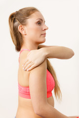 Obraz premium Woman putting ointment on injured arm