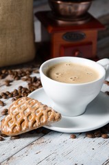 Coffee, gingerbread and old retro mill grinder