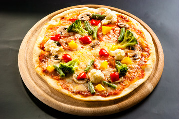 vegetarian pizza on the board