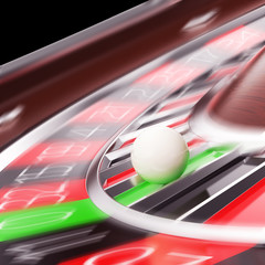 Casino Roulette closeup in motion.