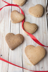 Homemade Heart Shape Cookies With Red Ribbon.