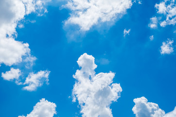 Naklejka na ściany i meble Looking up at Blue sky with cloudy