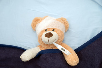 sick Teddy / Teddy Bear with Bandage and Clinical Thermometer