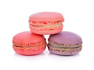 Tasty colorful macaroon on white background