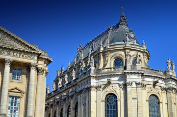 Fototapeta na wymiar Ornamented buildings of the Royal Chapel in front of the Palace of Versailles, France