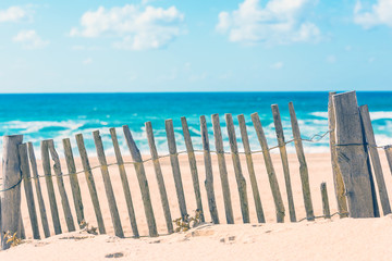 Wooden fence on an Atlantic beach in France
