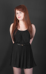 Fototapeta premium girl in a black dress