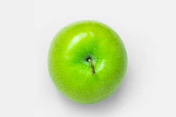 Green apple on white background, Top view