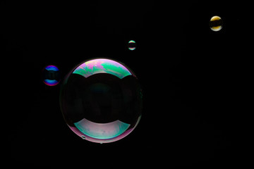 Soap Bubbles On A Black Background