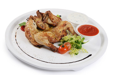 The baked hen with salad close-up
