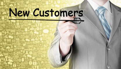 businessman writing new customers