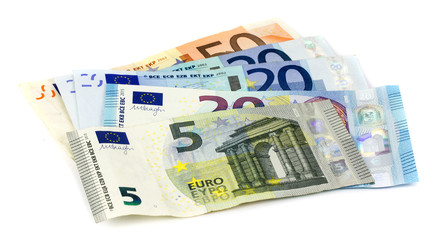 Obraz na płótnie Canvas Euro banknotes isolated over white with clipping path.