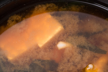 Closeup of delicious vegetable soup with tofu.